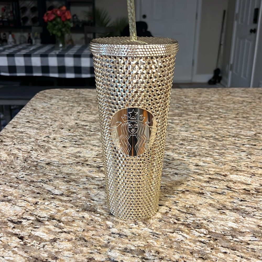 Gold Starbucks cup